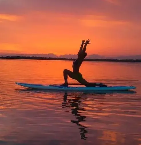 SUP WATER YOGA SUN SALUTATIONS.webp