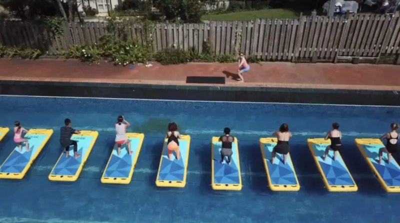 inflatable yoga float mat on water